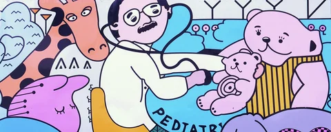 A colorful cartoon mural shows a doctor with a stethoscope among smiling animals.