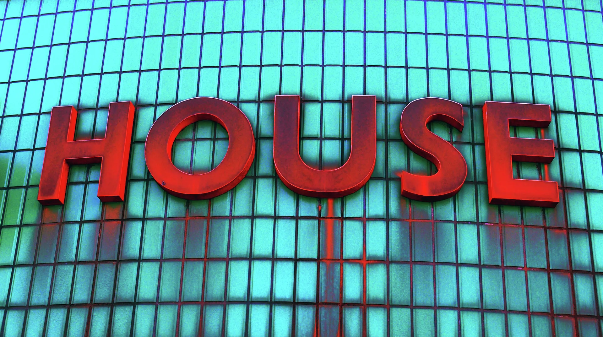 Large red HOUSE letters cast shadows across a curved wall of small turquoise tiles.